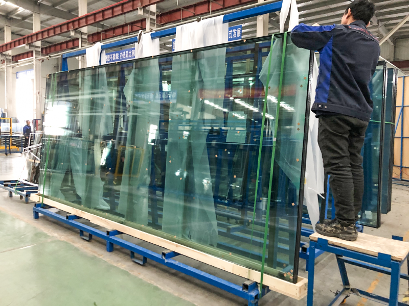 Laminated glass sheet transport frames